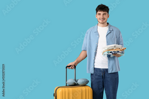 Male tourist with clothes a...