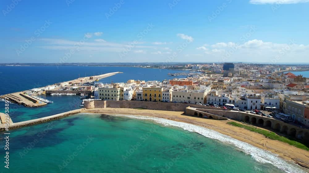 Gallipoli - Italy, Apulia - landing aerial view of the northern old town with view of the harbor Gallipoli - Italy, Apulia - landing aerial view of the northern old town with view of the harbor