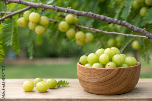 Fresh Indian Gooseberries in Wooden Bowl