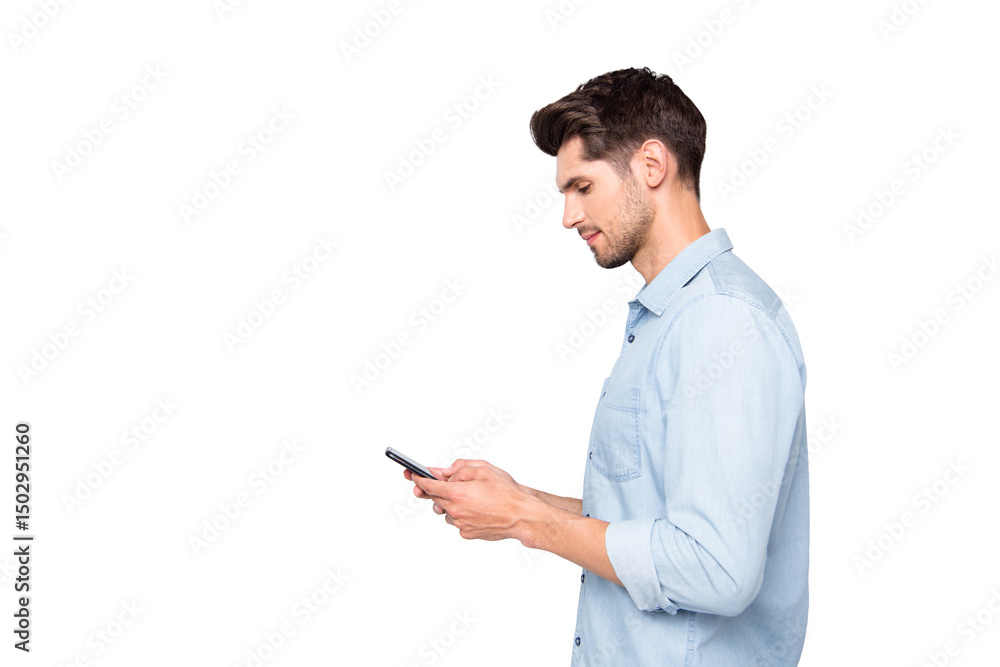 Profile side photo of concentrated man at copyspace using his cellphone reading feednews in social network accounts typing posts wear style outfit isolated over grey color background Profile side photo of concentrated man at copyspace using his cellphone reading feednews in social network accounts typing posts wear style outfit isolated over grey color background