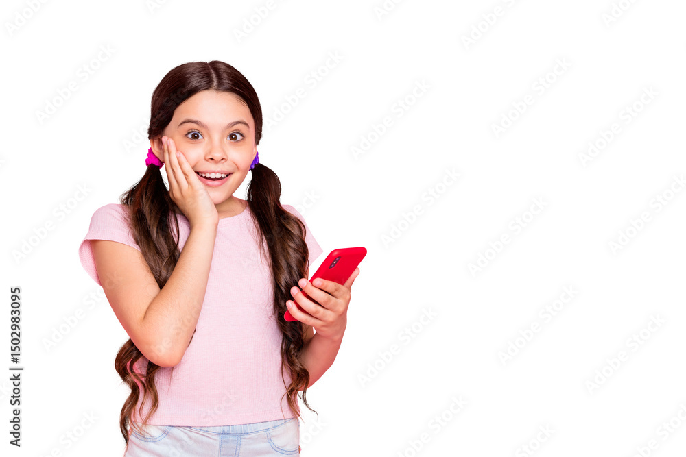 Portrait of astonished kid holding device screaming touch cheek with hand wear white t-shirt isolated over pink background Portrait of astonished kid holding device screaming touch cheek with hand wear white t-shirt isolated over pink background