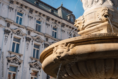 Canvas Print Traditional architectural detail of a fountain with gargoyles on Hlavne Namestie, the main town square in Old Bratislava, Slovakia