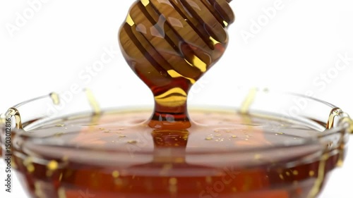 Honey splash in glass bowl with dripping dipper, glossy, cinematic orbit and zoom