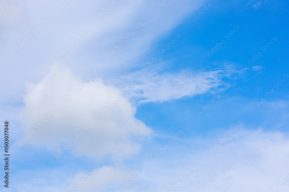 Beautiful cloud formations gather across a vivid blue sky, creating a stunning and peaceful natural backdrop. Beautiful cloud formations gather across a vivid blue sky, creating a stunning and peaceful natural backdrop.