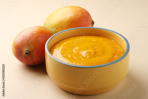 Indian Food - Aamras is a sweet dish made from the pulp of the Alphonso mango fruit. Served with hot puri/poori. Sweet Mango puree garnished with Kashmiri Saffron. Aam Ras Puri OR Alphonso Mango pulp