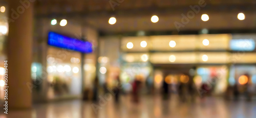 Wallpaper Mural Blurred view of people walking in an indoor space with shops and lights.premium shopping center background for poster, banner and flyer background Torontodigital.ca