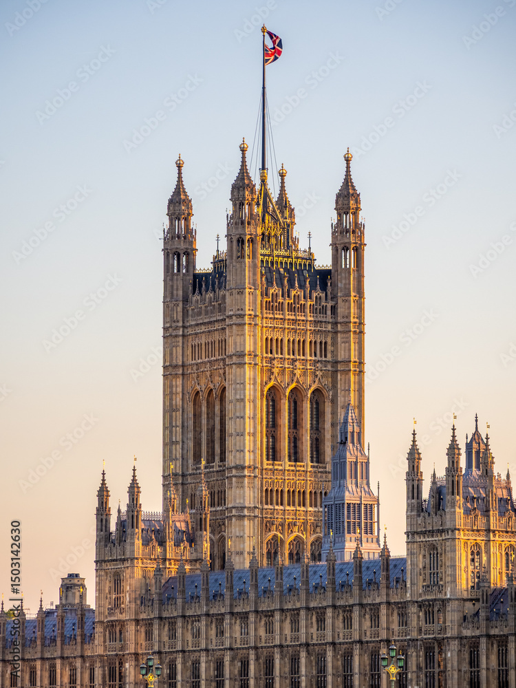Fototapeta premium Victoria Tower of the Houses of Parliament during golden hour in London