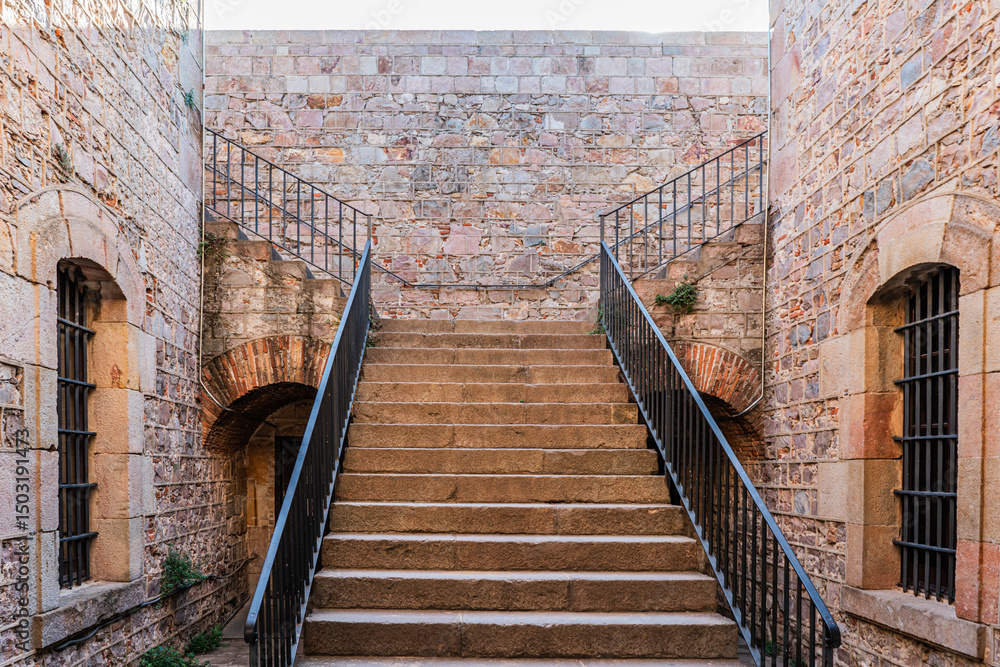 Obraz premium Stone staircase inside Montjuic Castle in Barcelona, Spain