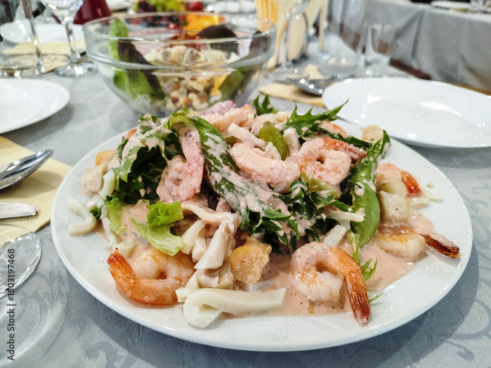 Seafood salad at a Restaurant Table Seafood salad at a Restaurant Table