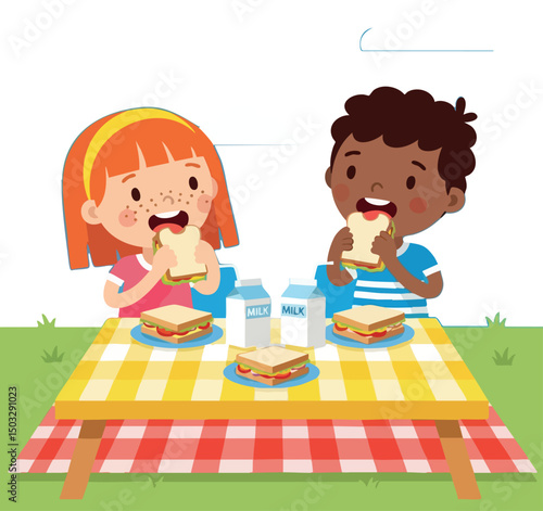Children enjoying sandwiches and milk at picnic table outdoors with yellow checkered tablecloth 