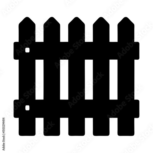 Silhouette of a picket fence creating a classic garden boundary visual