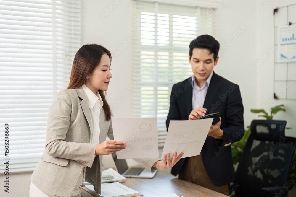Business Collaboration and Strategy. Professionals discussing project documents in modern office. Business Collaboration and Strategy. Professionals discussing project documents in modern office.