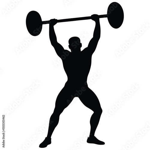 Silhouette of a weightlifter performing an overhead barbell lift during intense training