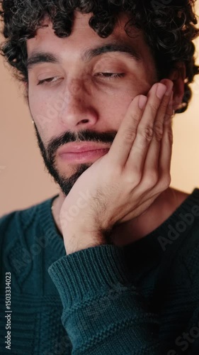 Vertical video, Thoughtful Gay Man Working From Home on Laptop