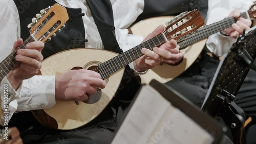 Musicians Playing Traditional Dalmatian Mandolins in slow motion in Croatia During a Live Performance, Close-up