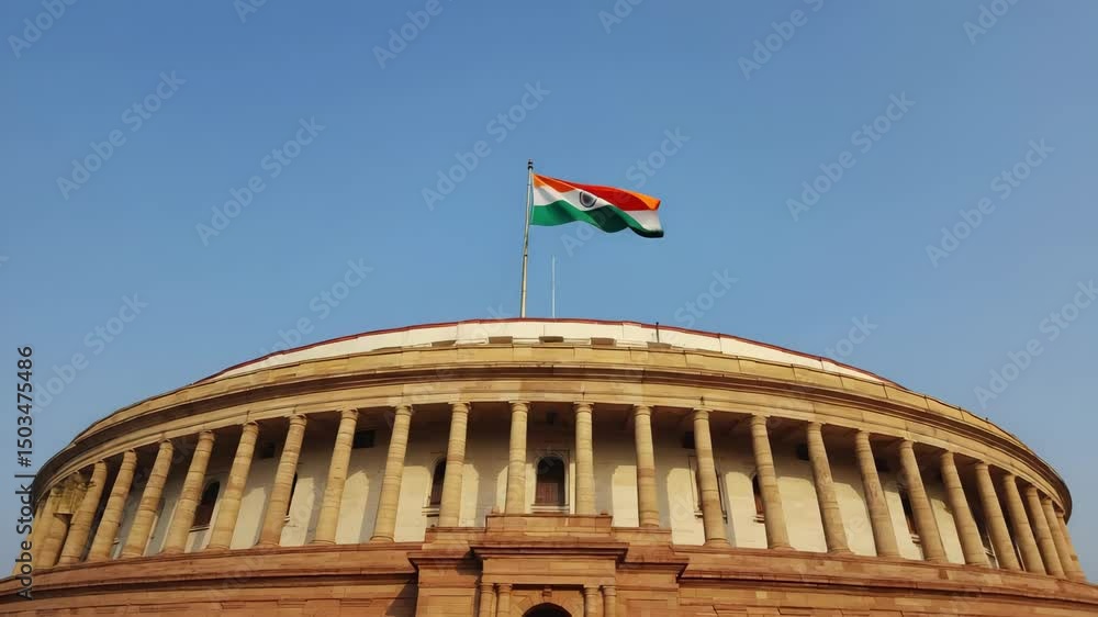 Indian National Flag Waving atop the Parliament House in New Delhi, India