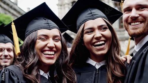Joyful graduation ceremony with excited students celebrating achievement together outdoors