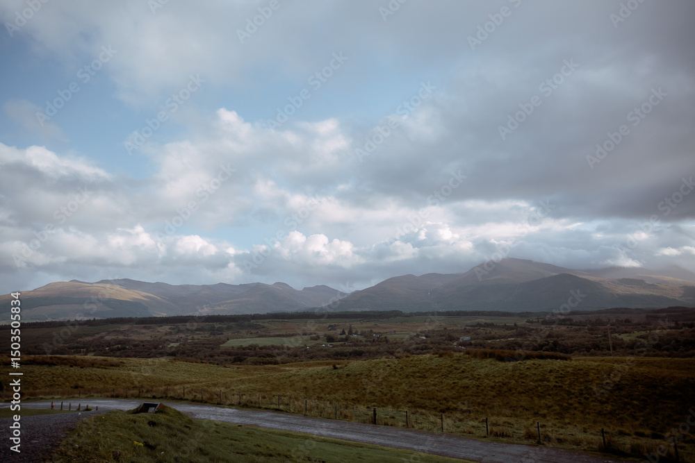 Fototapeta premium The hills of Scotland in the fall. Beautiful light, sky