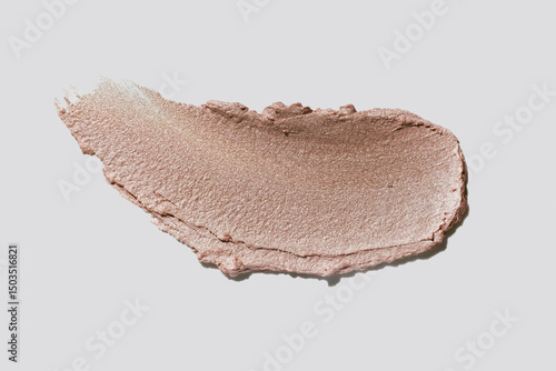 Fotografie Beige liquid high lighter or bronzer simmer glitter eye shadow texture