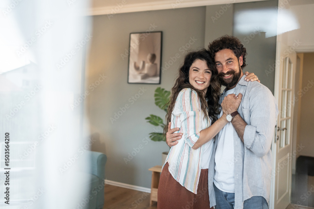 Happy couple embracing in their new home, celebrating new beginnings Happy couple embracing in their new home, celebrating new beginnings