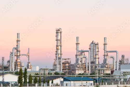 Oil gas refinery plant or petrol chemical plant at duck sky background. Heavy industry in Map Ta Phut Industrial Estate to processing, manufacturing petroleum products i.e. diesel fuel and gasoline.