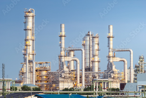 Oil gas refinery plant with blue sky background in Map Ta Phut Industrial Estate, Thailand. Petrochemical plant or processing plant to manufacturing gasoline fuel and power energy.