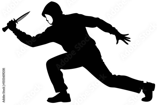 Silhouette of a Man in a Hoodie Lunging With a Knife in an Action Pose During Twilight