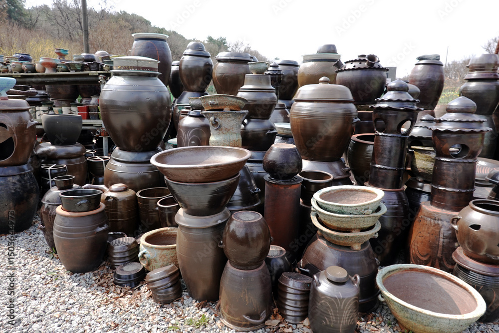 Korean traditional earthenware on display at a pottery store Korean traditional earthenware on display at a pottery store