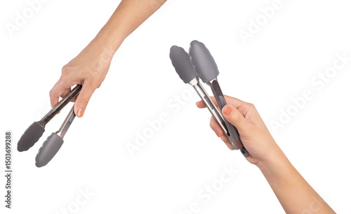 Foto Hand holding kitchen tongs on white background