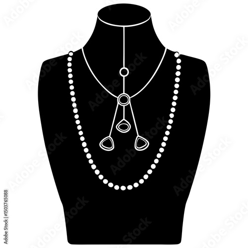Necklace display on a black jewelry bust