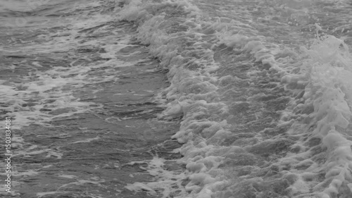 A footage of ocean tidal wave at the sea caused by boat engine.