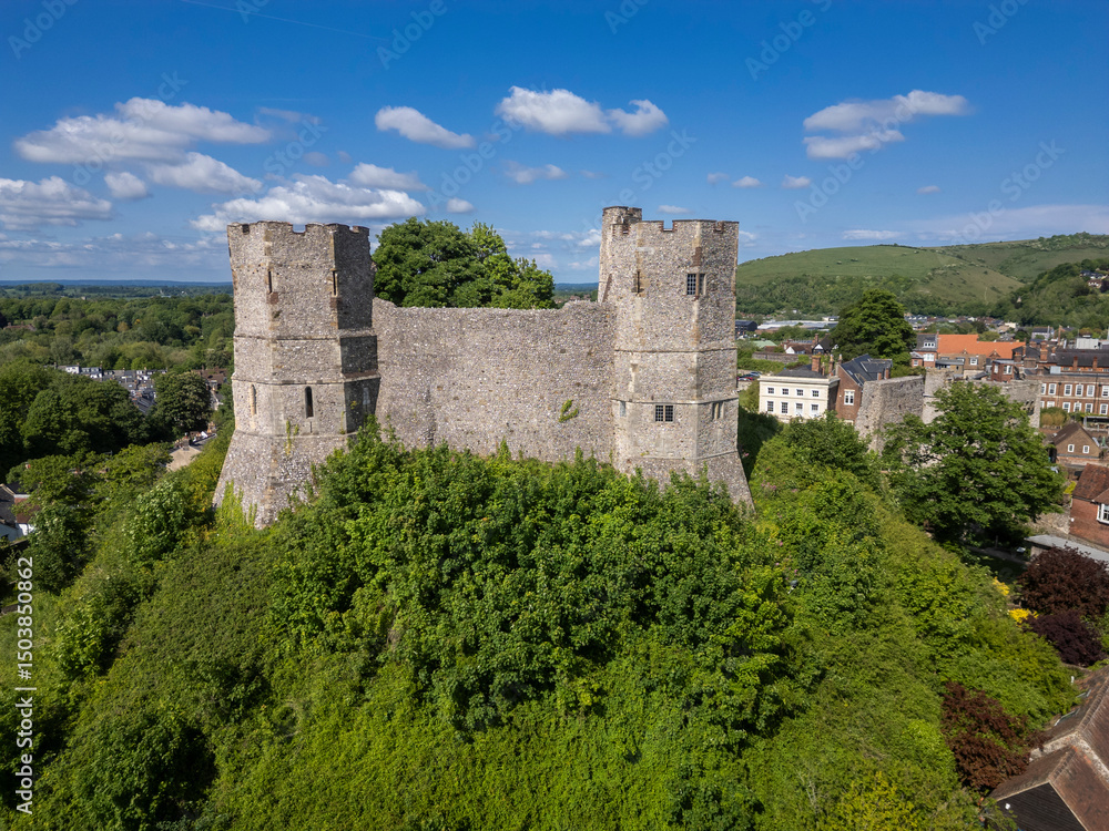 Beautiful aerial view to old historic medieval castle in green hill Beautiful aerial view to old historic medieval castle in green hill