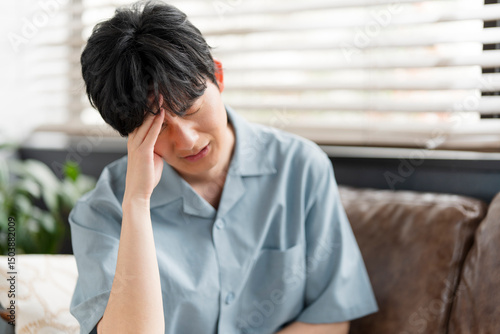 体調不良、若い日本人男性