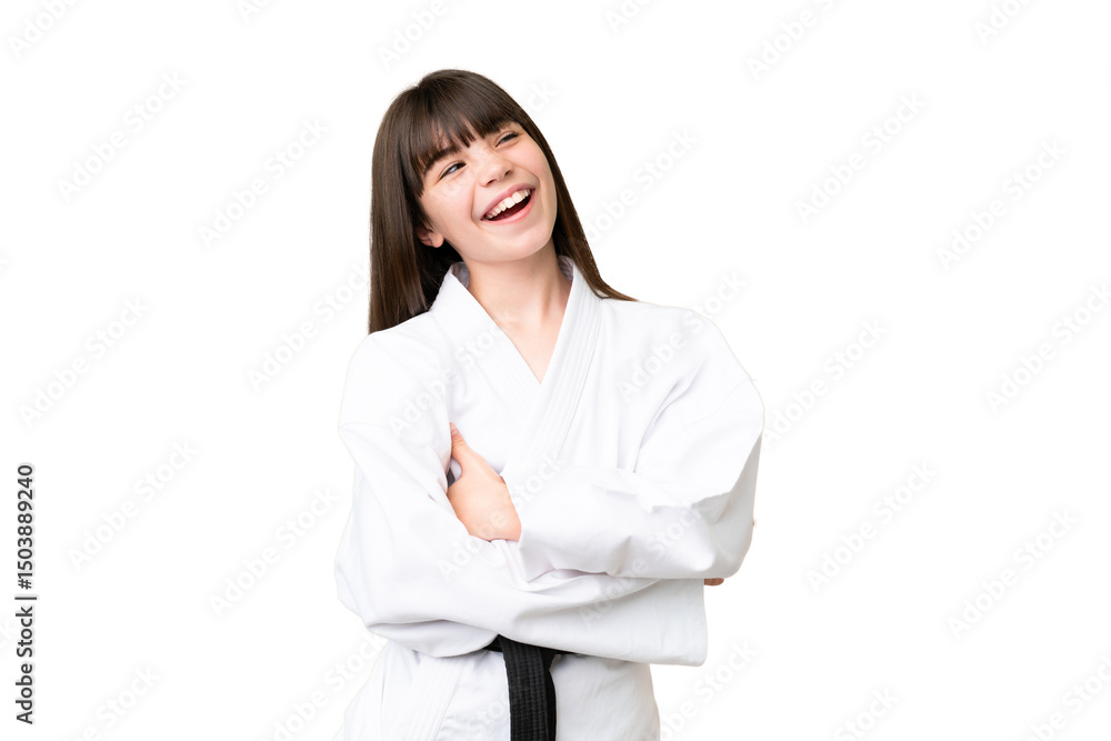 Little Caucasian girl doing karate over isolated background happy and smiling Little Caucasian girl doing karate over isolated background happy and smiling