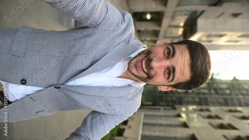 Business man using phone for video call. 