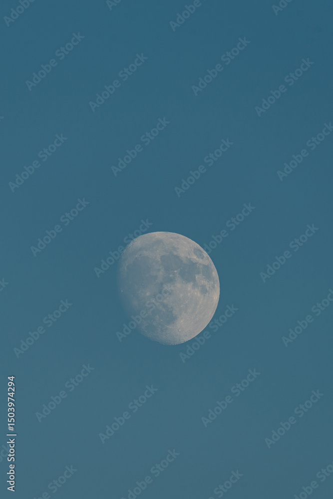 Almost full moon over a blue sky. Almost full moon over a blue sky.