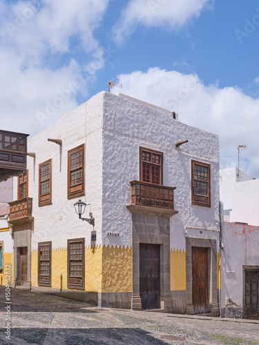 Traditional House Facade with Shutters and Cactus Garden in Las Palmas de Gran Canaria, Canary Islands