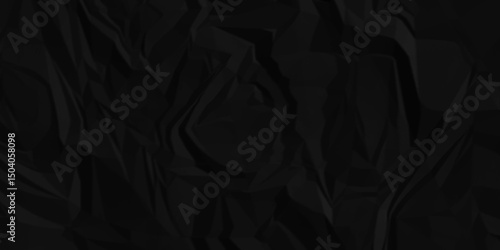 Crumpled paper texture . Black wrinkled paper texture. Black crumpled and top view textures can be used for background of text or any contents .	
