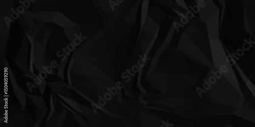 Crumpled paper texture . Black wrinkled paper texture. Black crumpled and top view textures can be used for background of text or any contents .	
