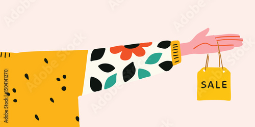 The hand holding a sale tag offers an inviting invitation to browse the sale, beckoning with an irresistible proposition. 