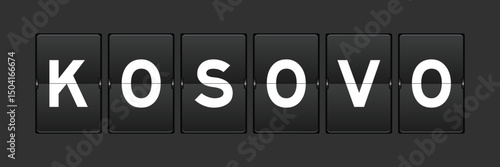 Black color analog flip board with word kosovo on gray background