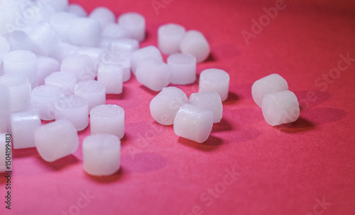 camphor pill on red background. camphor isolated view. use for clean environment, healthcare, worship, praying. To make the environment cleaner. To cure illness.
