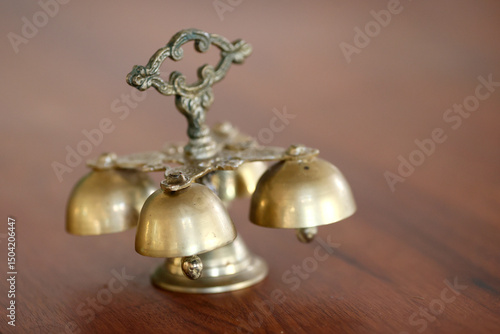 Bilde på lerret Catholic mass. 4 tone liturgical bell in brass.