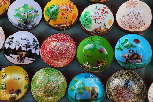 A festive set of colorful Easter egg decorations with ribbons, a symbol of holiday celebration