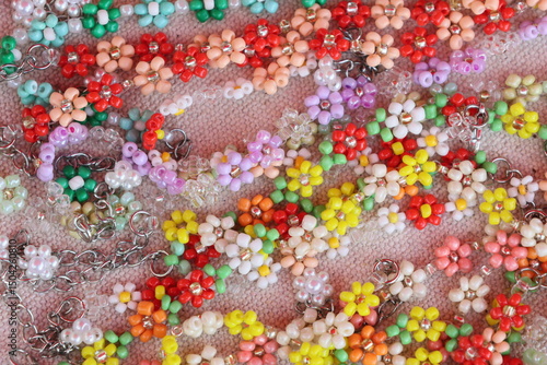Bright floral pattern with colorful fabric texture for a sweet spring background