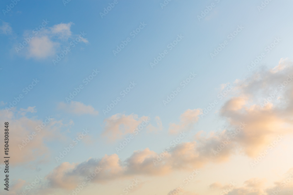 Background of clouds and orange sky in the morning,Beautiful Vivid sky painted by the sun leaving bright golden shades Background of clouds and orange sky in the morning,Beautiful Vivid sky painted by the sun leaving bright golden shades