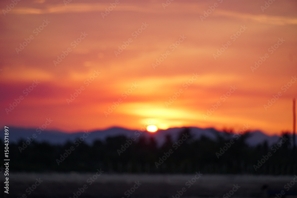 Beautiful abstract nature bokeh sunset or sky as background. Sunset blurred bokeh background, sunrise soft focus, tropical island beach dawn, sundown orange sun shine reflection, summer Beautiful abstract nature bokeh sunset or sky as background. Sunset blurred bokeh background, sunrise soft focus, tropical island beach dawn, sundown orange sun shine reflection, summer