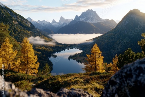 Breathtaking Autumn Landscape Showcasing Mountains, Lake, and Golden Trees Un...