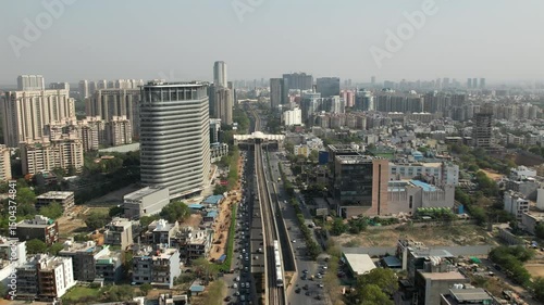 Drone Shot of DLF Golf Course Road Gurgaon – Aerial View of Luxury High-Rises, Modern Infrastructure, Green Spaces, and Premium Real Estate in Gurugram, India