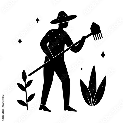 Silhouette of a farmer with a rake in the field